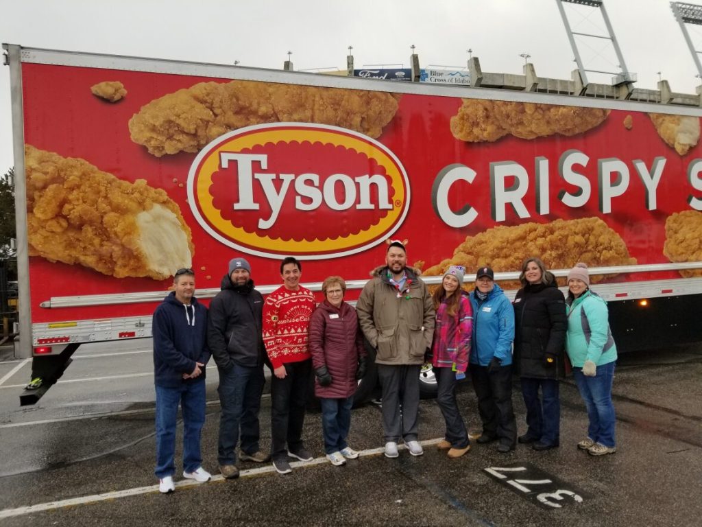 Randy Ford, Karen Vauk with Tyson Foods and the IFB Team at 7 Cares
